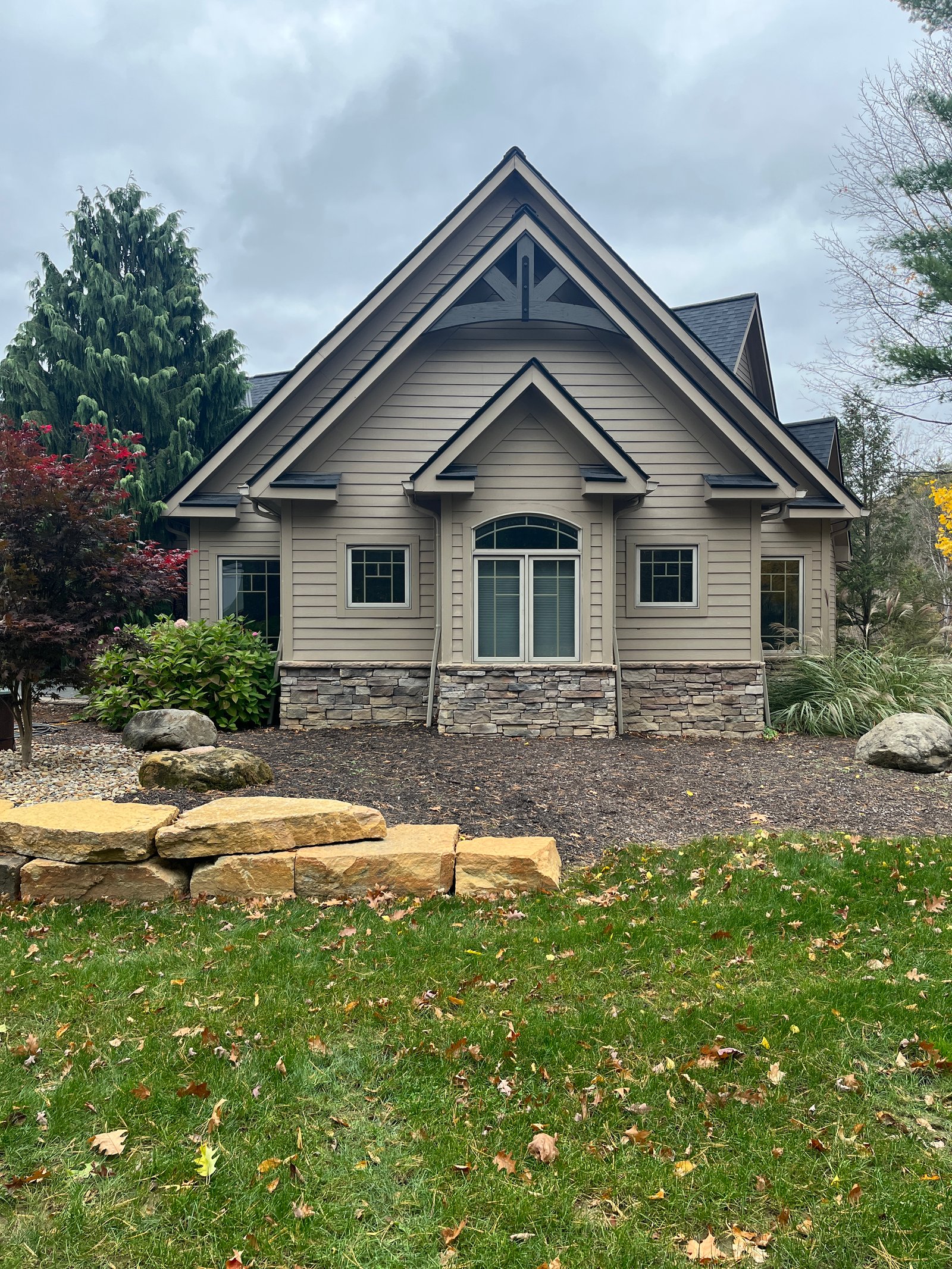 Rear view of home with gable truss