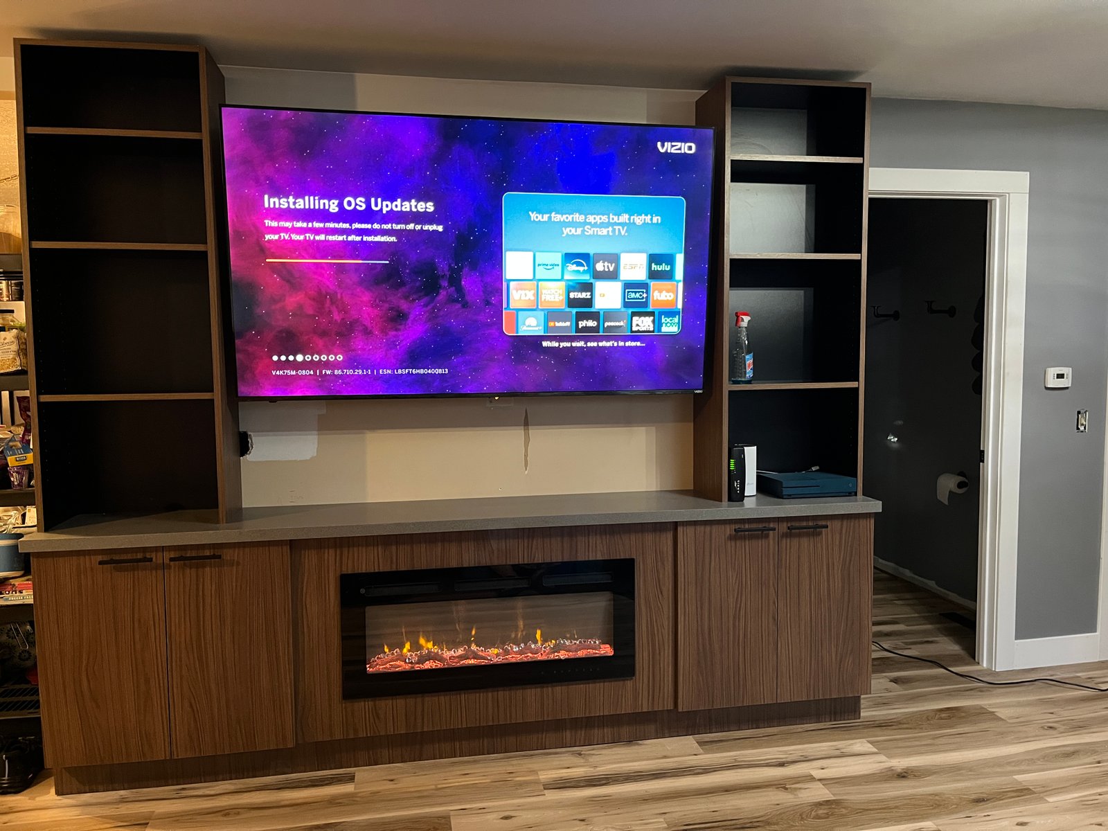 Front elevation stone home with custom truss and shutters